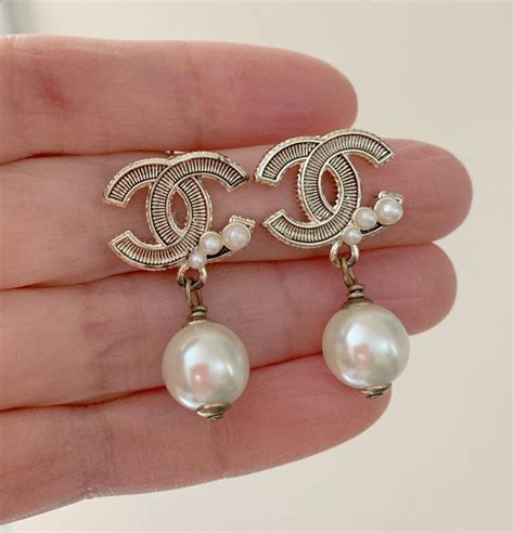 chanel earrings gold pearl|authentic chanel pearl earrings.